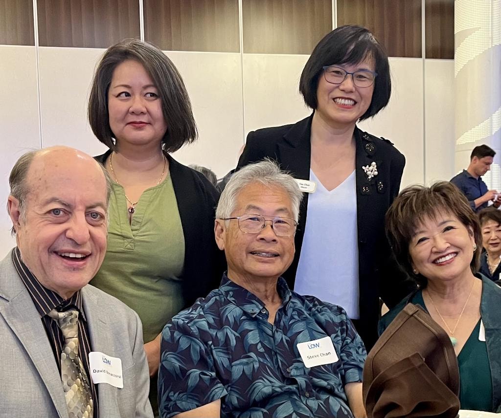 Sue Chan with supporters at a community event