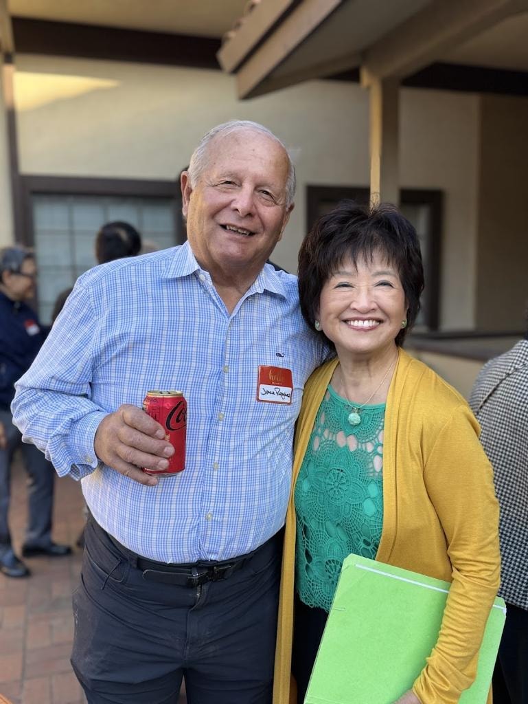 Sue Chan with supporter at campaign event
