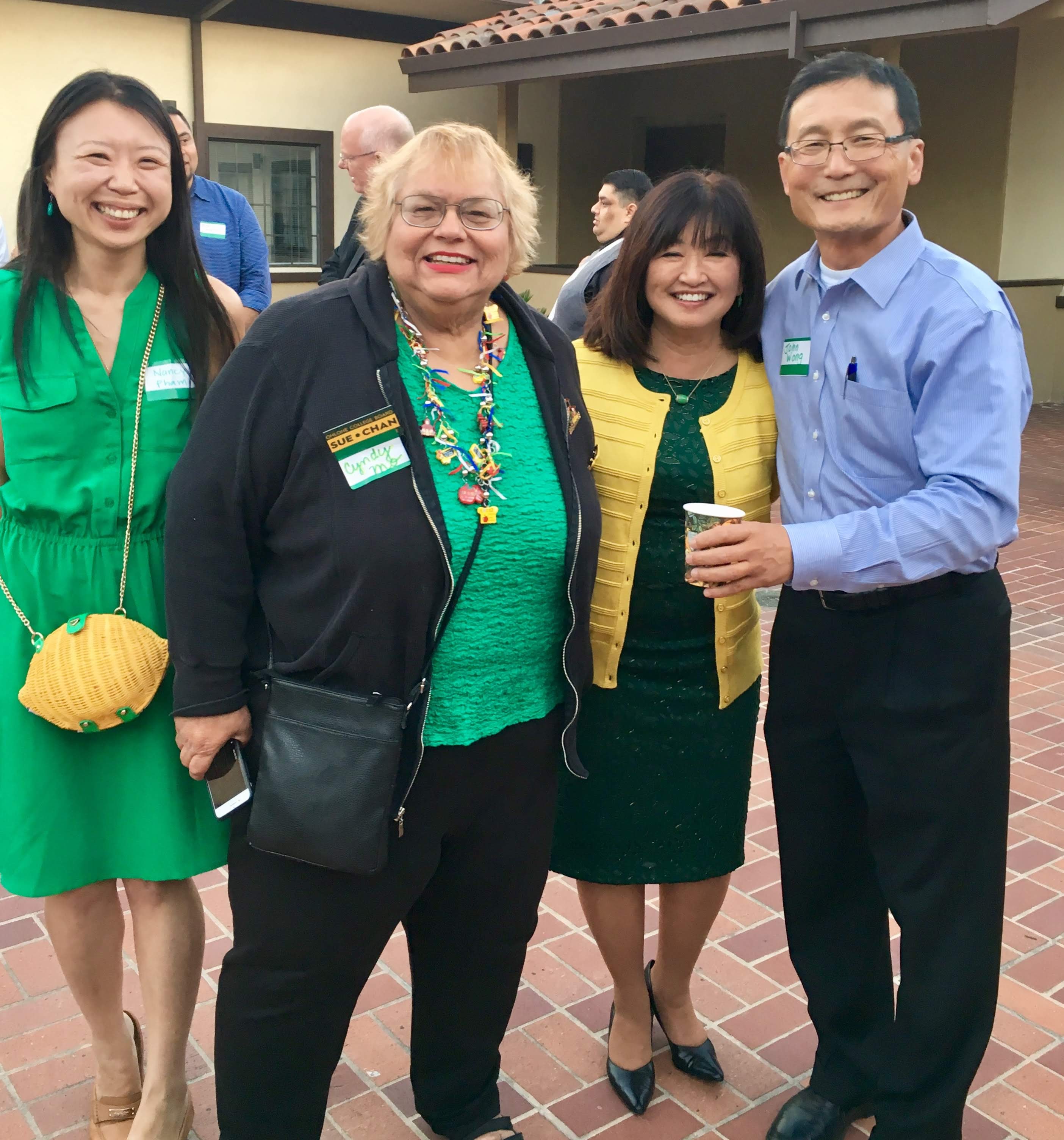 Sue Chan with group of elected officials at outdoor event